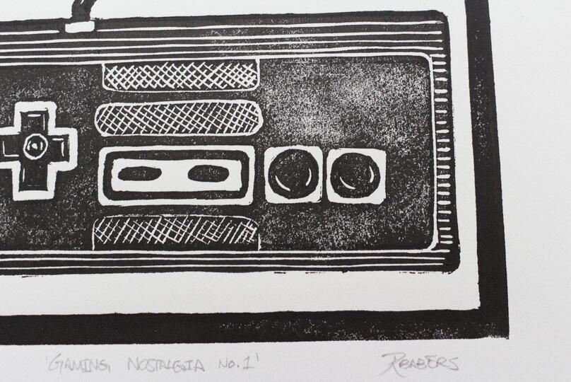 A blockprint of a retro NES controller.
