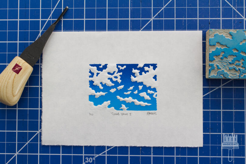 2x3" Blockprint of a blue sky and clouds with dry embossing.