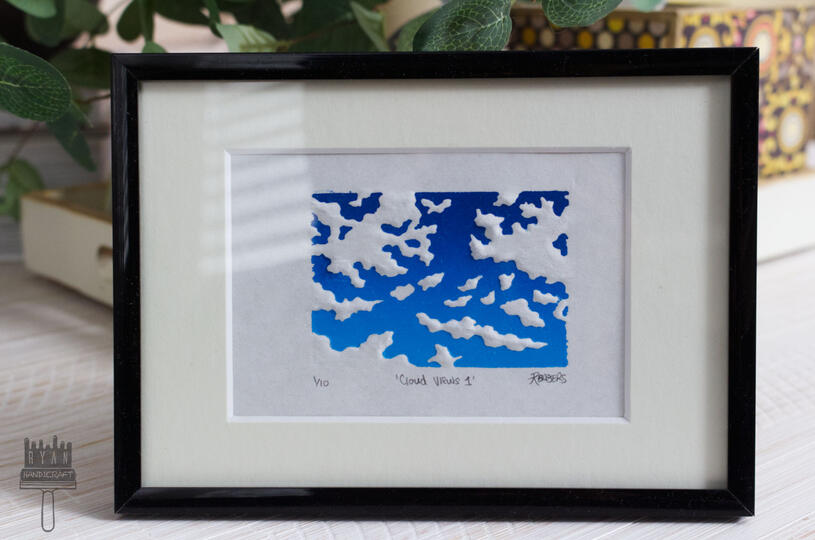 2x3" Blockprint of a blue sky and clouds with dry embossing.